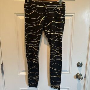 Nike Black and Gold Running
Leggings